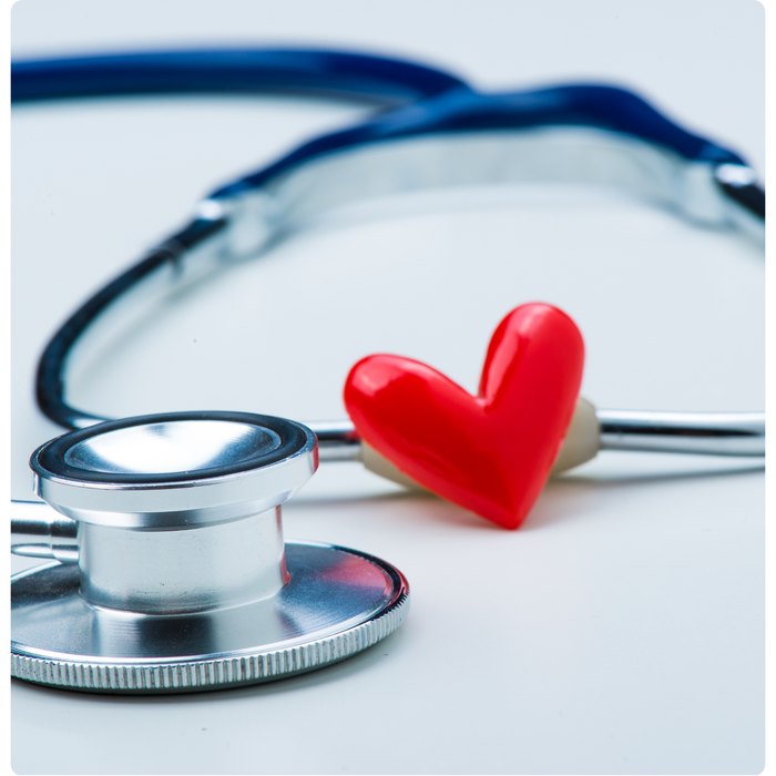 Stethoscope beside a red heart