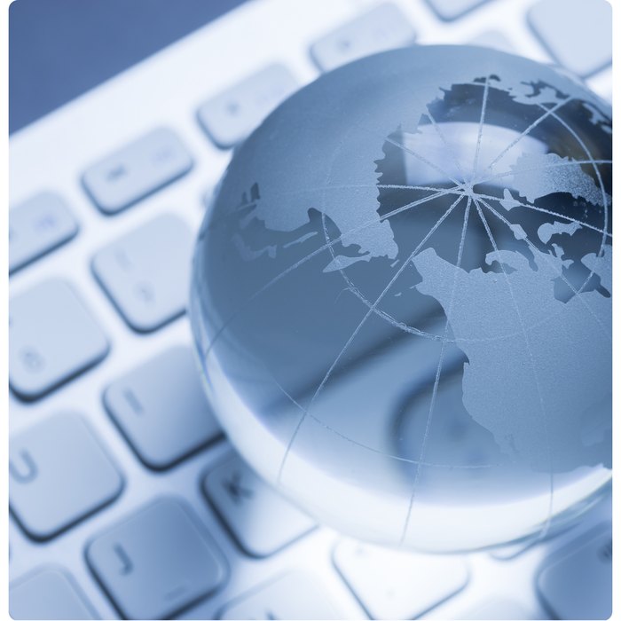 Glass globe on a keyboard